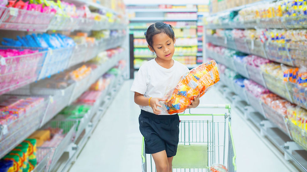 Price and Promotion - child in grocery store aisle