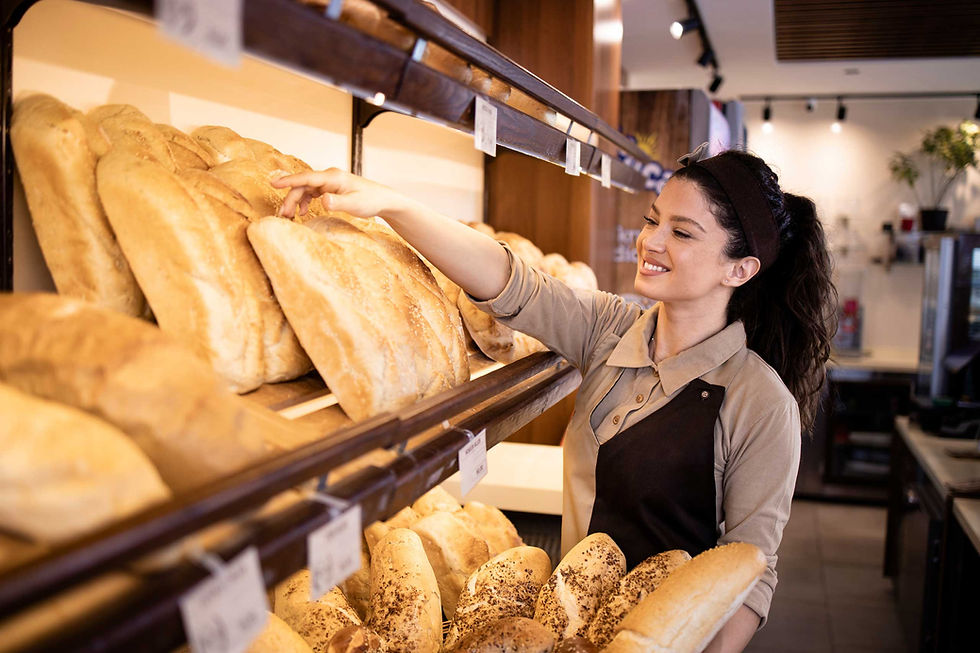 On-Shelf Availability - a baker putting items on a shelf